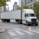 Chicago truck right-turn pedestrian accident risk at an urban intersection with a cyclist nearby