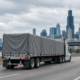 Chicago truck cargo shift accident liability illustrated by an unmarked freight truck on an urban roadway